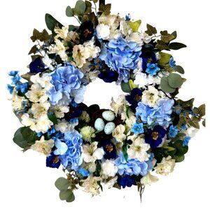 Blue Hydrangea wreath with poppies, birds nest and faux robin eggs. Beautiful!!